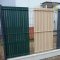 Plastic filler for meshes and panels made of PVC strips - 3D vertical fence slats - green color